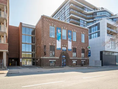 brick facade building with expansive windows